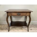 A rectangular oak side table having a drawer to the frieze, on cabriole legs joined by an under