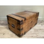 A pine and iron mounted lodging box with iron side carrying handles, 92cm wide x 47cm deep x 46cm