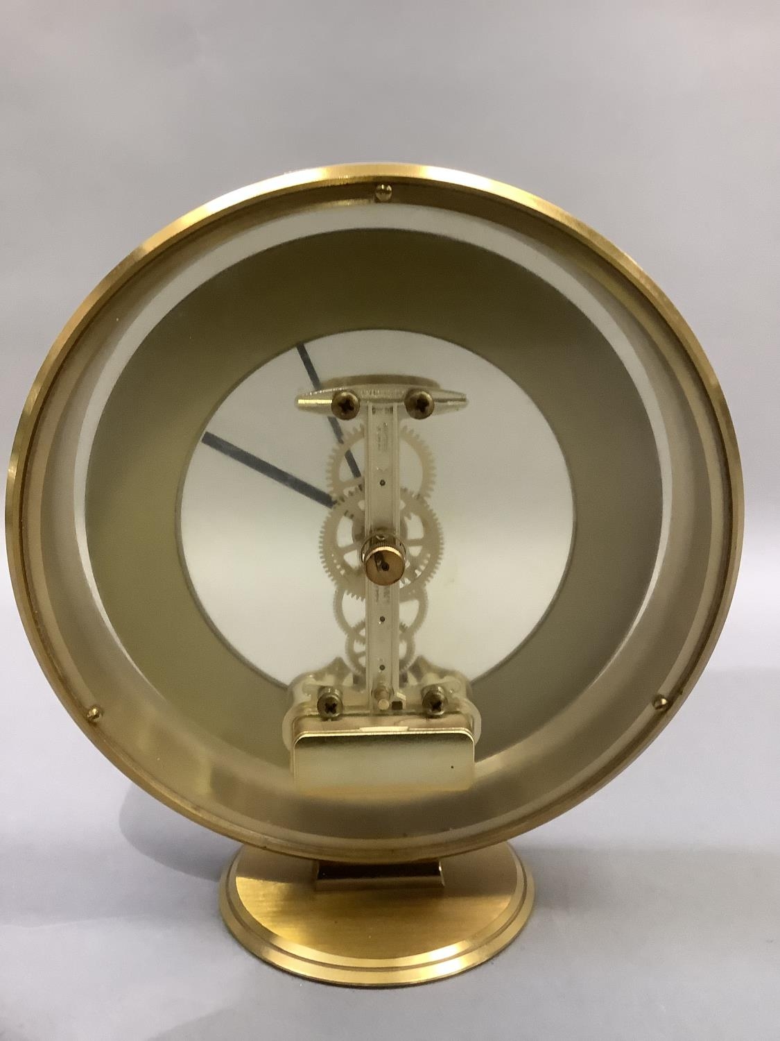 An Acctim gilt metal mantel clock with exposed quartz movement, circular chaptering with black Roman - Image 3 of 3