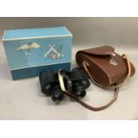 A pair of Carl Zeiss Jenner 8x30 field glasses in leather carrying case and original box packaging