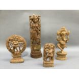 Four Indian balsa wood figures, three of Shiva and the fourth of Ganesh, measuring 34.5cm the