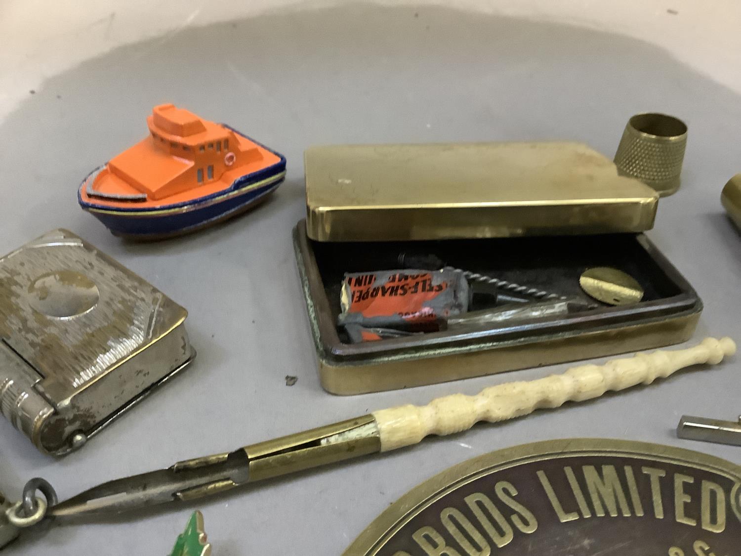 A copper and brass box, a brass plaque for Harrods Ltd ironmongers & Co, a white metal vesta in - Image 5 of 5