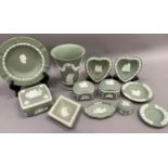 A collection of Wedgwood green jasperware including vase, square box and cover, pair of boxes, small