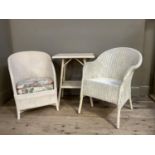 A cream Lloyd Loom tub chair together with a Sirrum tub chair and a bamboo two tier table