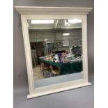 An ivory painted wall mirror, rectangular, 90cm by 101cm