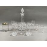 A cut glass sherry decanter together with five long stemmed panel cut sherry glasses on conical