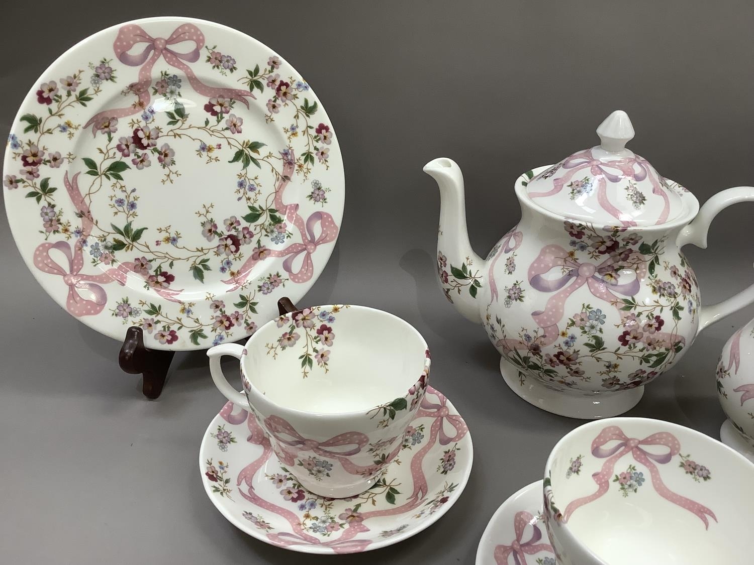 A china part service printed in pink, blue, mauve and green with a ribbon and floral sprays design - Image 2 of 4