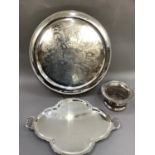 Late 19th/early 20th century plated on copper wine coaster having a gadroon floral and shell rim,