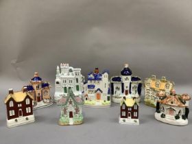 A collection of early 20th century and later Staffordshire cottages, some as pastille burners