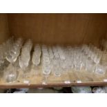 A quantity of cut glass including wines, flutes, sherries, water glasses, liqueurs, various