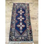 A North West Afghanistan rug, 183cm x 81cm
