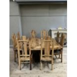 A dining table and chairs by Jarobsky, made from South African railway sleepers comprising large