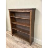 An set of oak open book shelves with rose carved frieze on square legs, 91cm wide x 23cm deep x