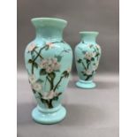 A pair of Victorian duck egg blue glass vases of baluster form, hand painted with apple blossom,