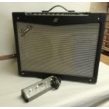 A Fender Mustang four Solid State Modelling guitar amplifier, approximate output 100 watts,