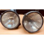 A pair of large Marchal Aerolux headlamps, pre-war, with intact lenses and reflectors
