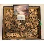 A vintage wooden jigsaw, 742 pieces, depicting men in a rowing boat pulling away from the shore in
