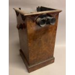 A Victorian figured walnut table top stereoscope viewer, incomplete, with mounted eyepiece,