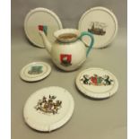 Two W. H. Goss porcelain tea pot with Newport I. W crest 14.5cm high and two teapot stands with