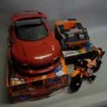 Action Man Sports Car with rocket launcher, six-wheel Jungle Explorer and a motorbike