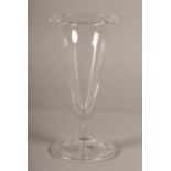 A LARGE ALE GLASS c.1790, the plain trumpet bowl with flared rim, on a short drawn stem inset with