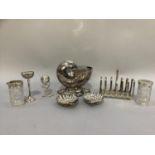 Silver plated ware including a Victorian nautilus shell spoon warmer, a pair of shell shaped bon bon