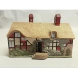 A W. H. Goss porcelain pastille burner-model of Ann Hathaway's Cottage, Rd No. 208047, pub. by W