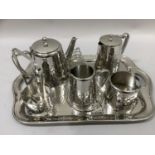An Old Hall stainless steel tea service comprising teapot, hot water jug, milk jug, sugar bowl,