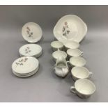 A Royal Doulton Pillar Rose pattern tea service comprising six cups, six saucers, six plates,