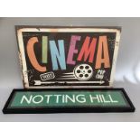 A reproduction framed Notting Hill sign and a Cinema sign