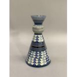 A Moorland Staffordshire pottery vase of conical form painted with arrowheads in shades of blue