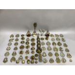 A quantity of Victorian and later horse brasses and tack