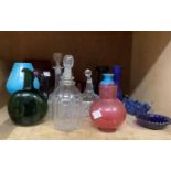 Items of coloured glassware including green glass ewer, cranberry glass jug, decanters, ruby glass