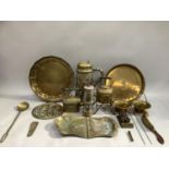 A quantity of brass ware including a large embossed brass tankard, spirit kettle and stand, miners