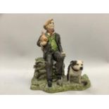 Resin figure entitled 'A Ramble' by Colyn James depicting a farmer sitting upon a wall, a chicken