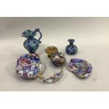 Four items of Murano millefiori glass including a small ewer, jug, egg on pedestal stand an a jar