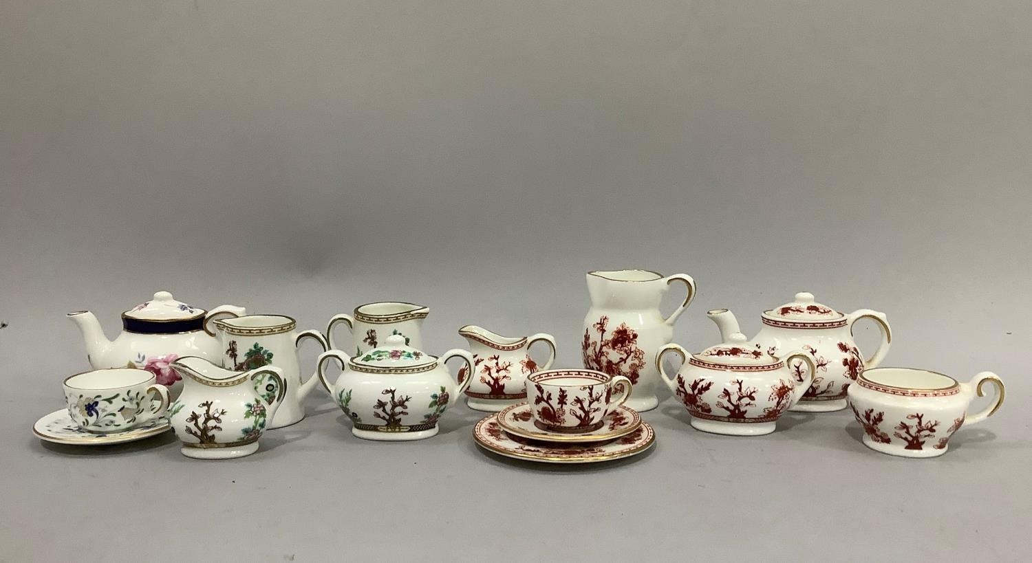 A Coalport miniature tea sevice of Indian tree design, teapot, two handled sugar bowl, cream jug,