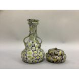 A Murano Mille fiore two handled vase in shades of aubergine, white, yellow and green 20.5cm
