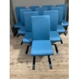 A set of twelve turquoise leatherette and chrome cantilever contemporary dining chairs by Vida