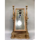 A pine Victorian Revival toilet mirror having rectangular glass on a base with drawer