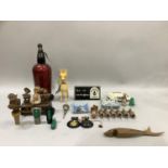 Bar related novelties including carved figure groups, spirit pourers, Dow's port ashtray,