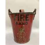 A George V red enamelled metal fire bucket and lid with swing handle lettered Fire Sand with