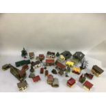A quantity of railway station accessories, buildings, trees, together with wood shed, supermarket