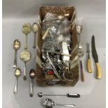 A large quantity of silver plate and stainless steel cutlery, carving set, fish knives and forks,