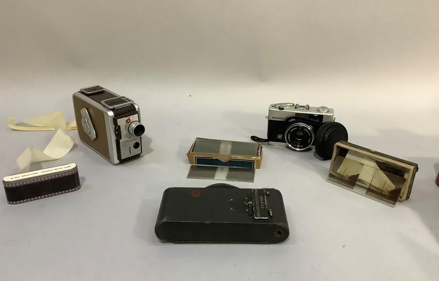 A Kodak Brownie 8mm movie camera, No.2 folding autographic brownie, two sets of Stereoscopiques