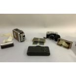 A Kodak Brownie 8mm movie camera, No.2 folding autographic brownie, two sets of Stereoscopiques