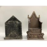 An Elizabeth II Coronation commemorative cast iron money box in the form of the Coronation throne,