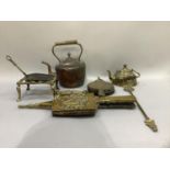 A quantity of brass and copper ware including chamber stick, copper pot, fire belows,