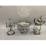 A silver plated octagonal cake basket on pedestal foot, a four flute epergne on circular base (no