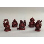 Five resin Chinese style figures of Buddha in five different poses.